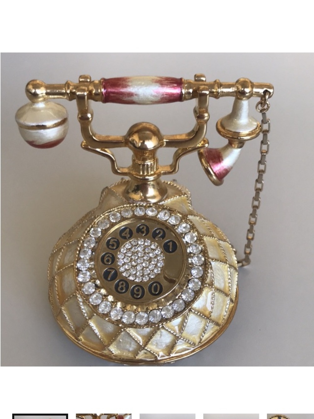 Vintage gold and ivory tabletop rotary phone figurine with pink accents